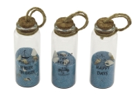 Bottles with blue sand and shells