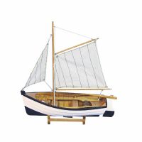 Wooden fishing boat with sails