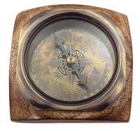 Compass on wooden base